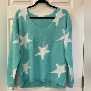 Blue sweater. Size small.